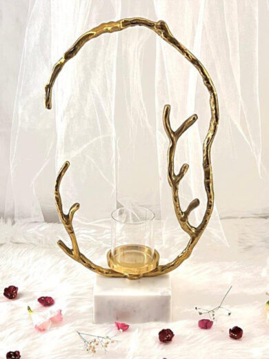 A tree branched shape showpiece with a glass candle holder